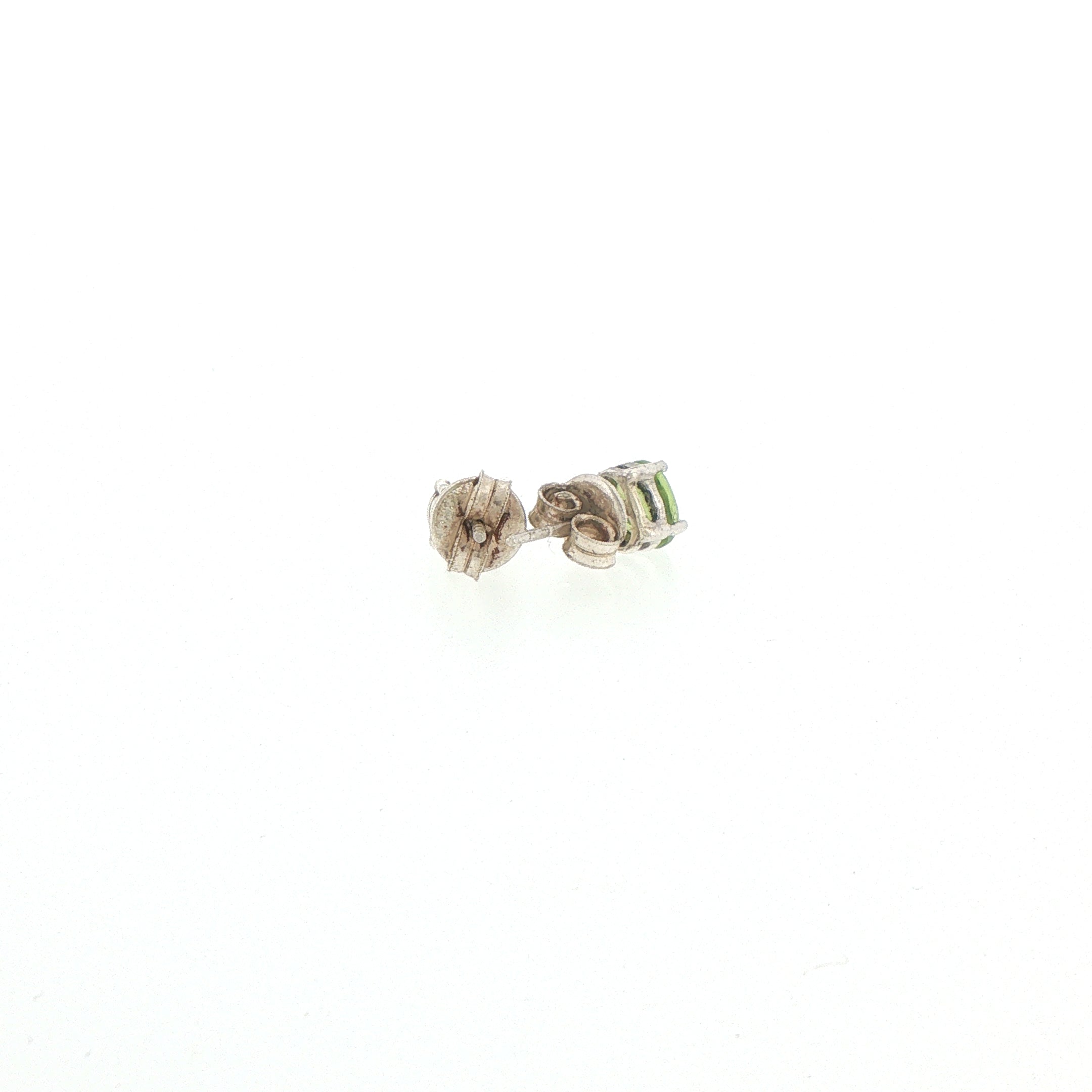 Oval Cut Peridot Stud Earrings in Silver