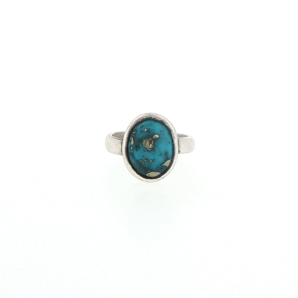 Oval Turquoise Cabochon Solitaire Ring in Silver
