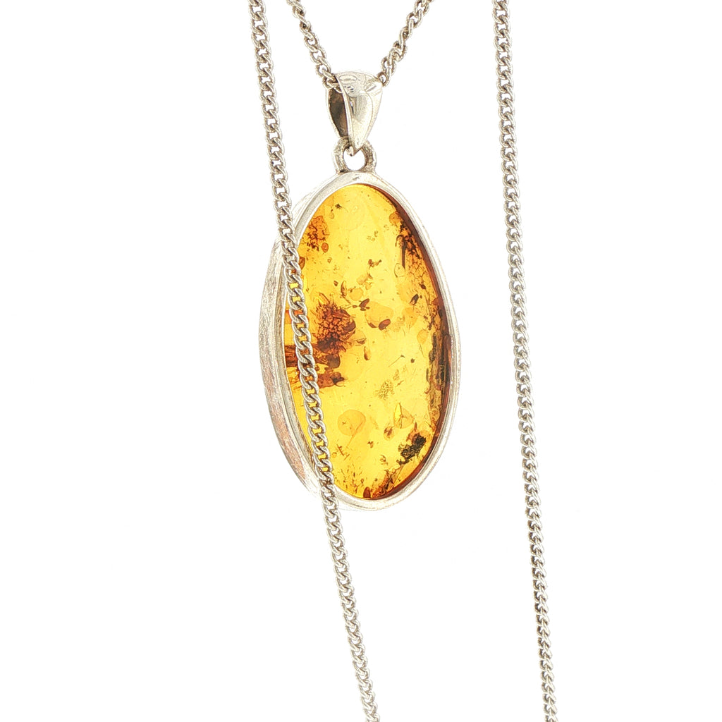 Oval Amber Pendant Necklace in Silver