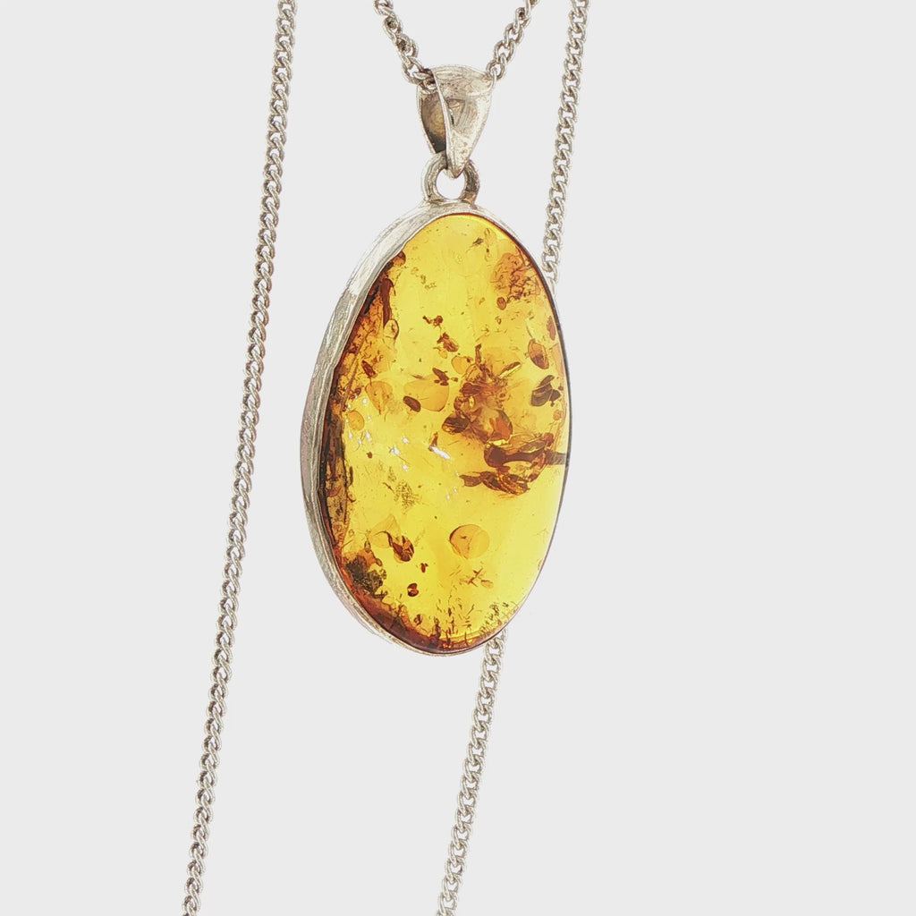 Oval Amber Pendant Necklace in Silver